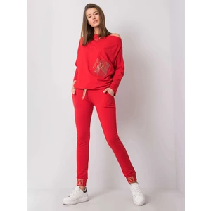 Red sweatpants with an application