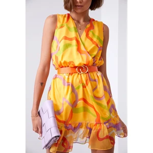 Light patterned dress with saffron purple belt