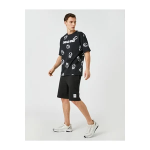 Koton Shorts with a tie-waist Slim Fit Shorts with Pockets and Printed Labels.