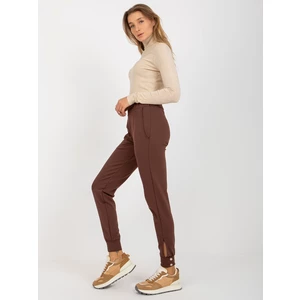Brown trousers with leg closure by OCH BELLA