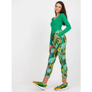 Green patterned sweatpants with pockets