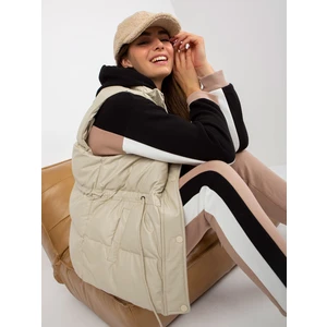 Light beige down vest made of artificial leather without hood