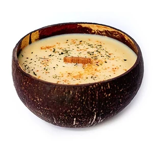 Tropikalia Svíčka v kokosu - vůně Thajská Limetka a mango