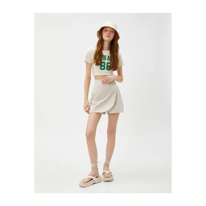 Koton Mini Skirt with Shorts Made of Cotton, with Pocket Detail at the Back. Elastic Waist.