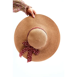 Fashionable hat with bow beige