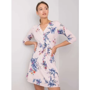 Women's light pink dress with floral patterns