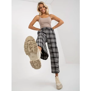 Black fabric culotte trousers with checkered pattern