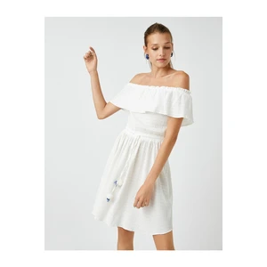 Koton Off-the-Shoulder Mini Dress with Tassel Detail.