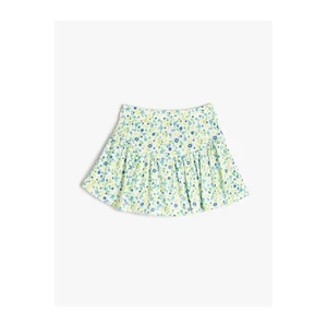 Koton Shorts with a skirt with floral ruffles and an elasticated waist with a ribbed waist.