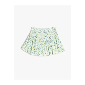 Koton Shorts with a skirt with floral ruffles and an elasticated waist with a ribbed waist.