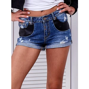 Blue denim shorts with fringes