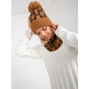 Lady's camel and black winter cap with pompom