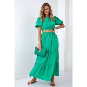 Lady's summer set blouse with a green skirt