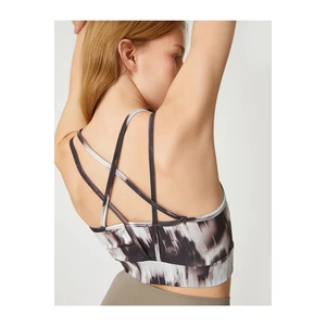 Koton Abstract Printed Sports Bra with Crossovers