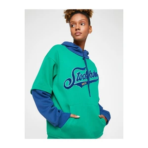 Koton Oversized Sweatshirt with a Hooded Kangaroo Pocket and Long Sleeves.