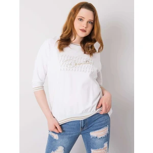 White blouse with an application and an inscription