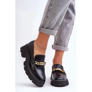 Classic moccasins on a massive black catch me platform!