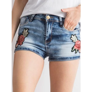 Blue denim shorts with patches