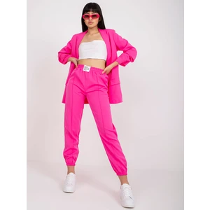 Fluo pink fabric pants with an elastic waistband