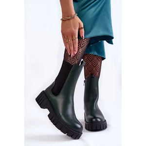 Leather women's boots on the platform green bente