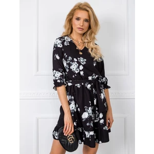 Black dress with artificial flowers