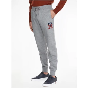 Světle šedé unisex žíhané tepláky Tommy Hilfiger - Pánské