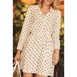 Delicate white polka dot dress