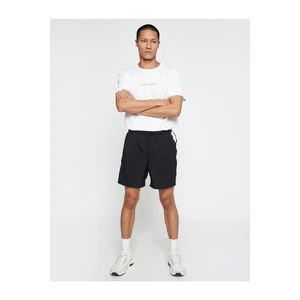 Koton Short Sports Shorts Double Layered with a lace-up waist with pocket.